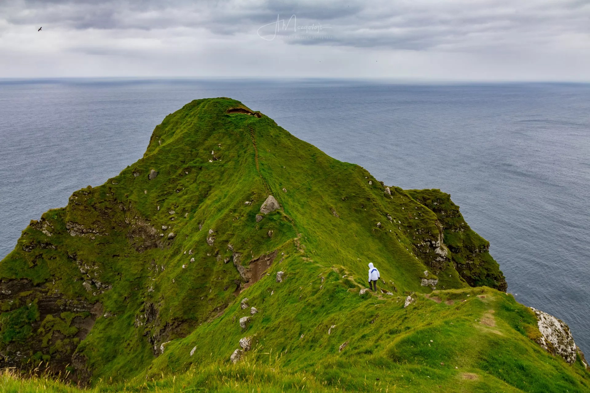 Katja daring a venture onto the western promontory behind Kallur Lighthouse