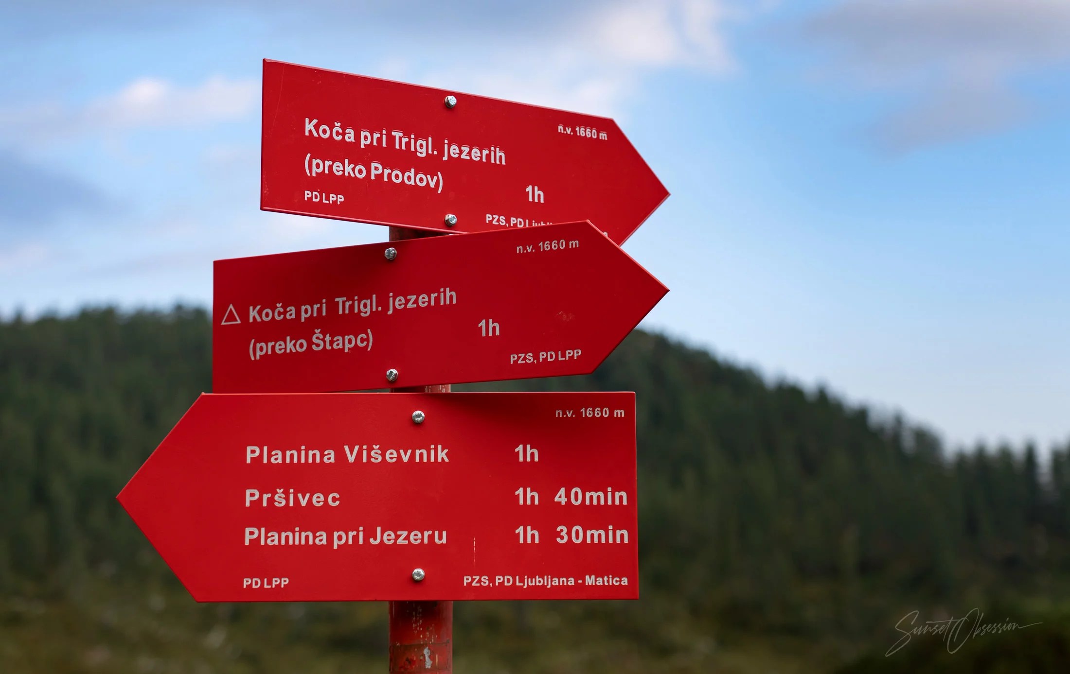 Confusing signs on the Seven Lakes Valley hike in Triglav National Park, Slovenia