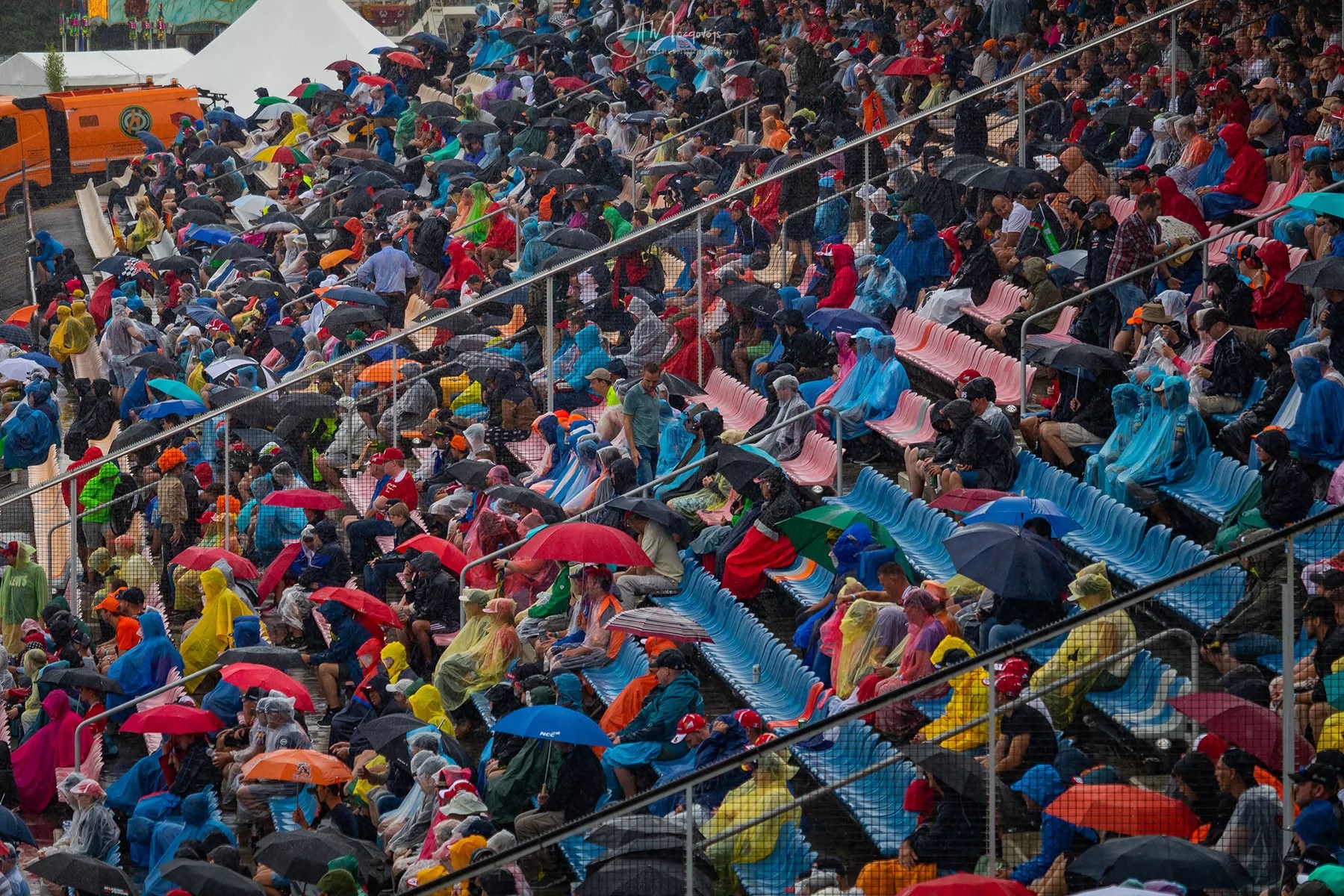 Formula 1 fans getting wet under the rain in Hockenheim