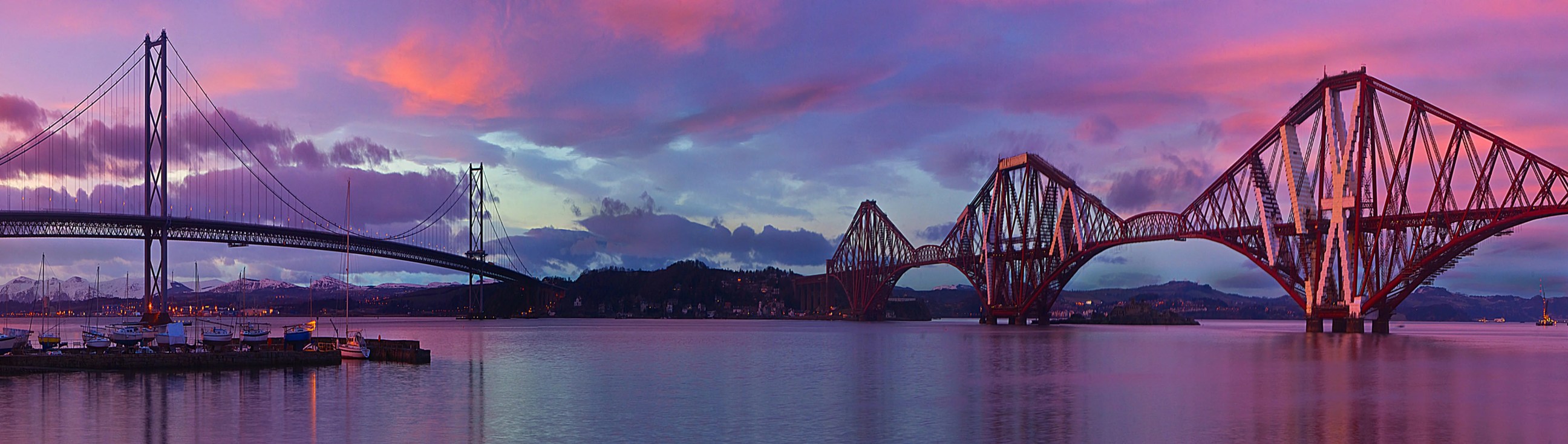 Forth Road Bridge to the left and Forth Bridge to the right