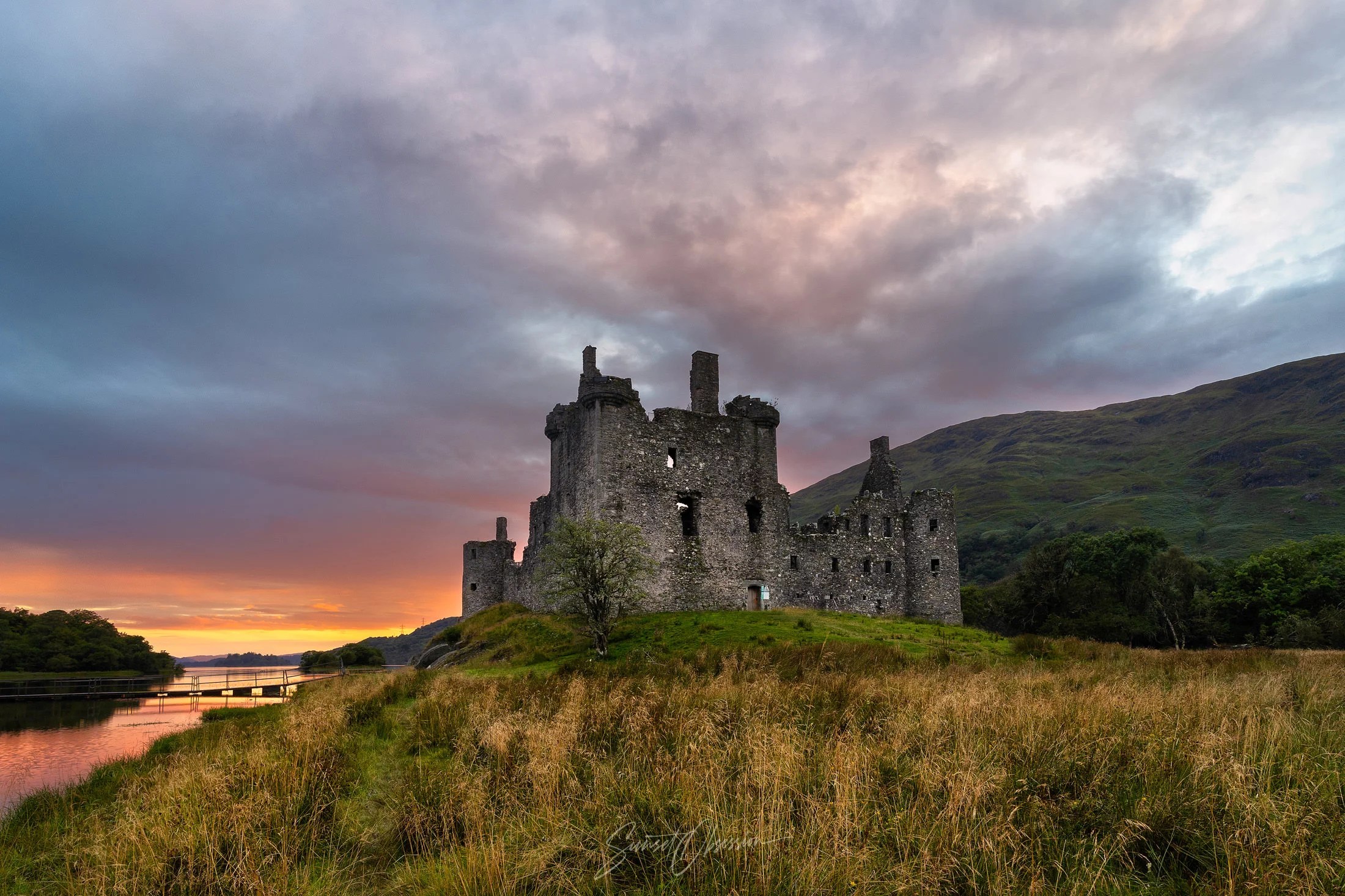 Kilchurn Castle in Scotland during sunset