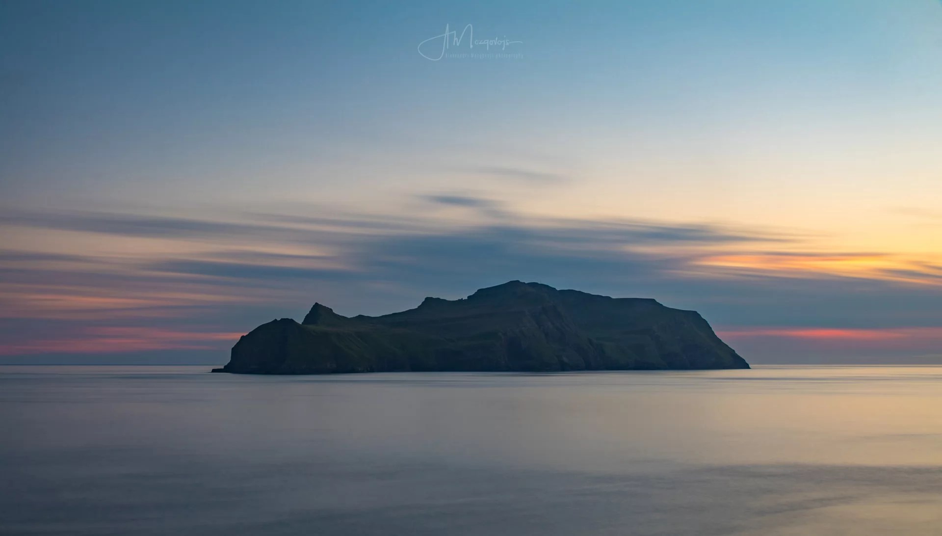 Sunset view of Mykines from Vágar