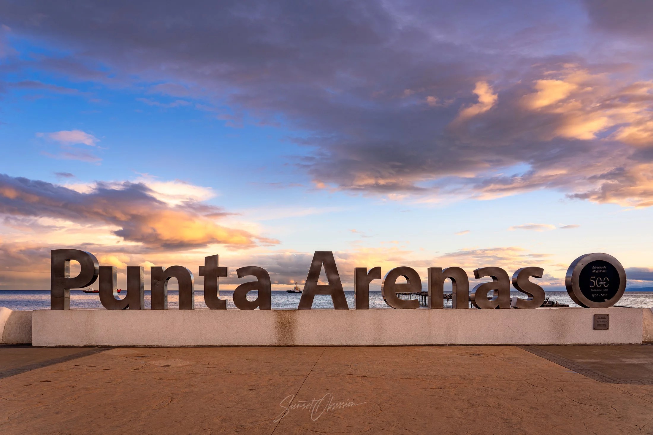 Punta Arenas town against the burning sky