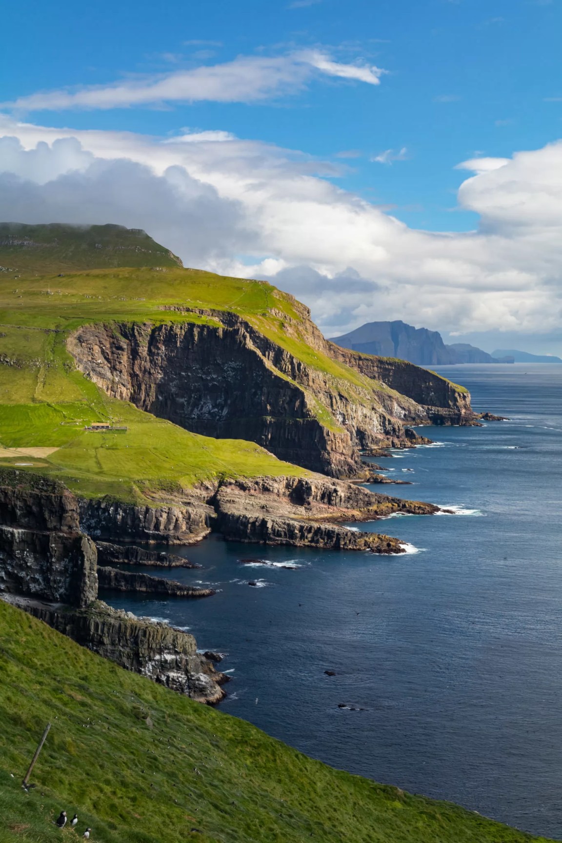 Rocky shoreline, island of Mykines, Faroe Islands