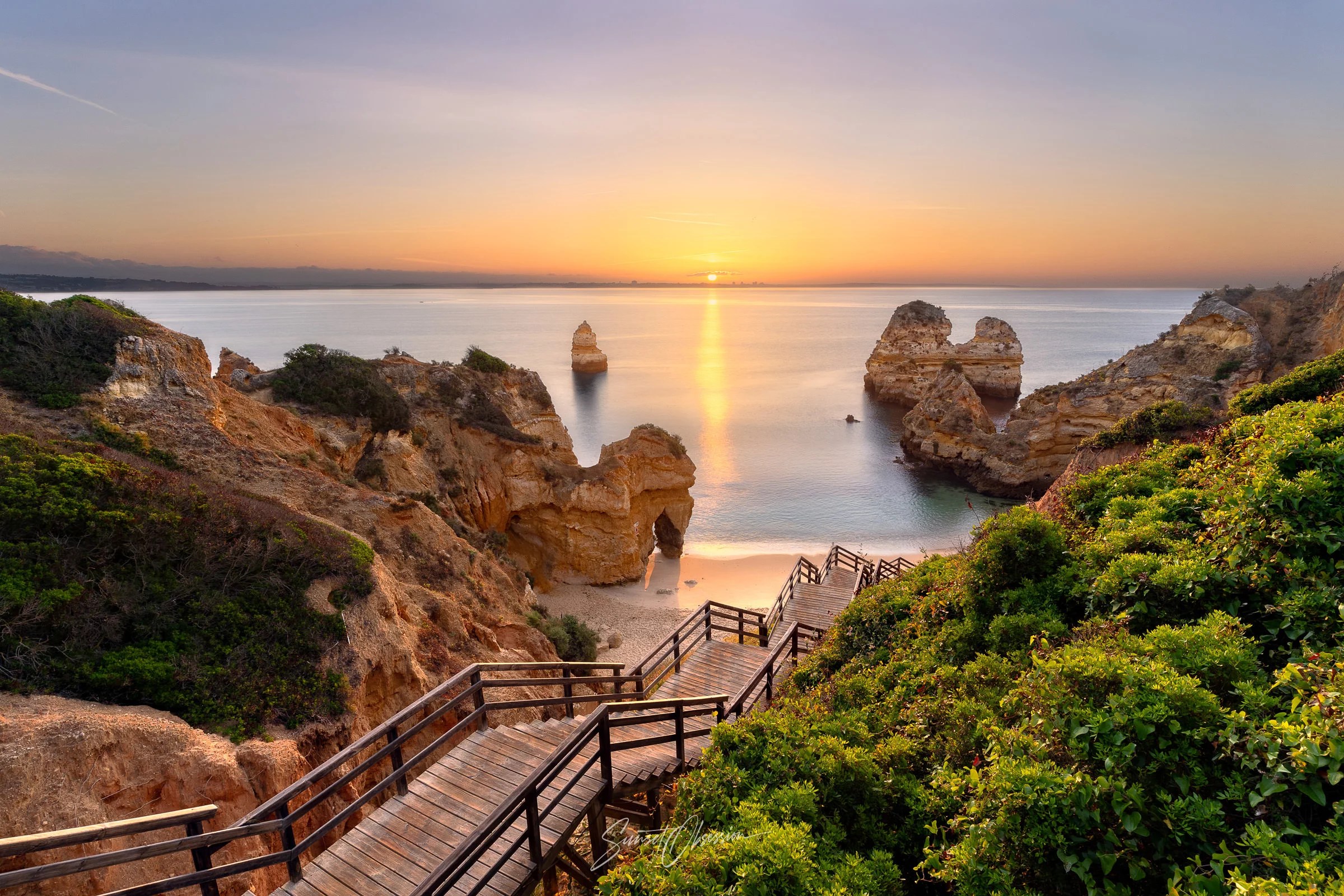 Sunrise at the Praia do Camilo beach, Algarve, Portugal
